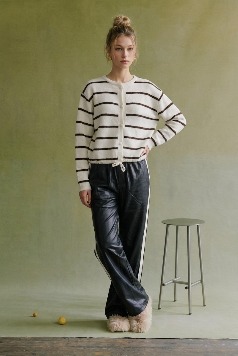Model in a striped cardigan